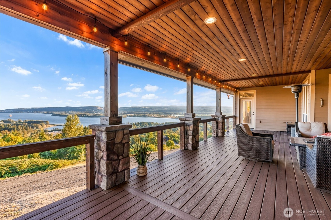 Covered back deck with sweeping Columbia River views at 413 Confer Rd, Kalama WA